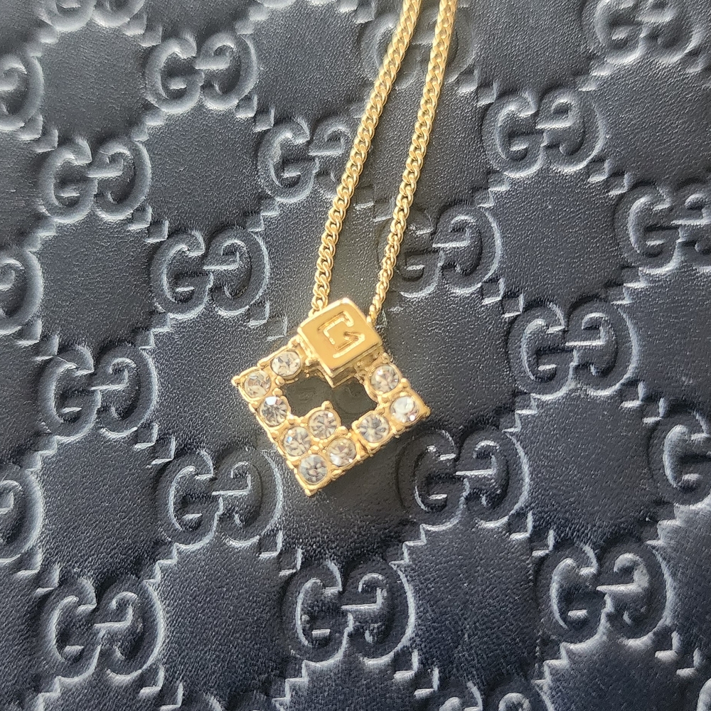 Givenchy Gold Intricate Pendant Necklace